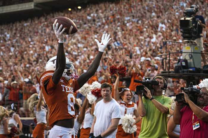 Texas wide receiver Xavier Worthy (8) celebrates a touchdown that put Texas up 7-0 over West Virginia during the game at Royal Memorial Stadium in Austin, Texas on Oct. 1, 2022. Xxx Austex10 Jpg Usa Tx