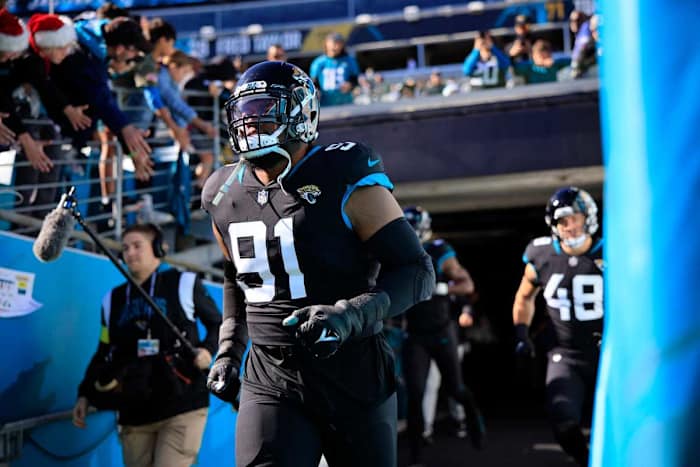 Jacksonville Jaguars defensive end Dawuane Smoot (91) takes to the field before a regular season NFL football matchup between the Jacksonville Jaguars and the Dallas Cowboys Sunday, Dec. 18, 2022 at TIAA Bank Field in Jacksonville. The Jacksonville Jaguars edged the Dallas Cowboys 40-34 in overtime. [Corey Perrine/Florida Times-Union] Jki 121822 Cowboys Jags Cp 101