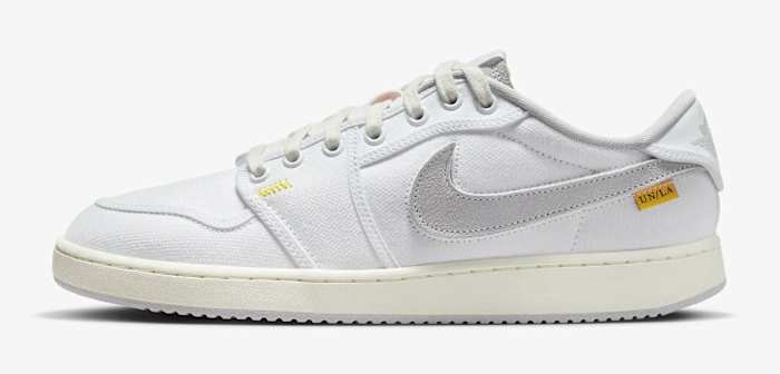 Side view of a white and grey Air Jordan sneaker.