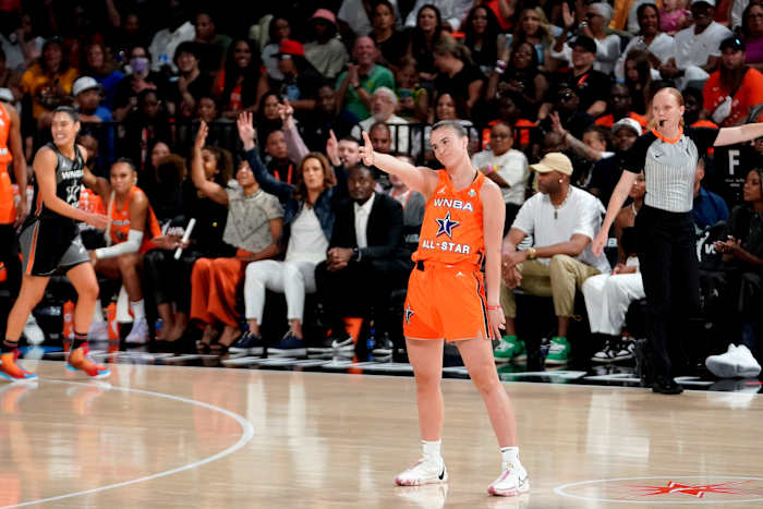 Sabrina Ionescu celebrates after scoring in the 2023 WNBA All-Star Game.