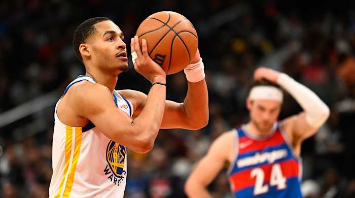 Jordan Poole shoots a free throw in Warriors vs. Wizards game.