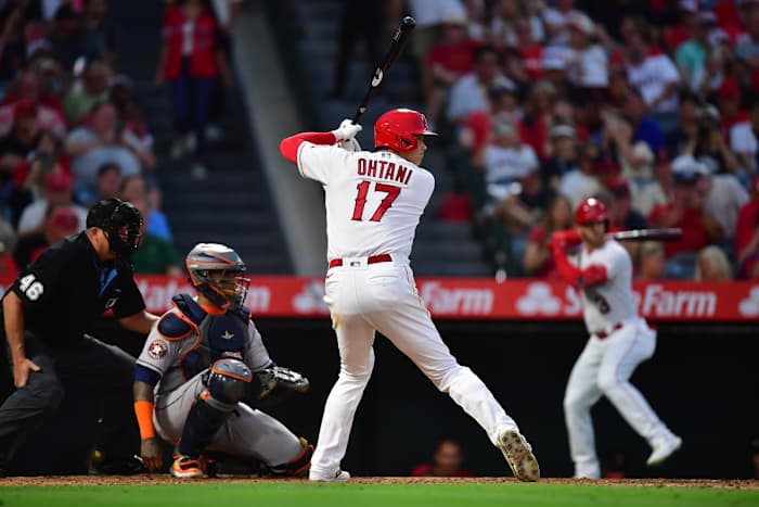 Shohei Ohtani sets up for an at bat with his back to the camera
