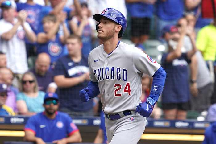 Jul 6, 2023; Milwaukee, Wisconsin, USA; Chicago Cubs center fielder Cody Bellinger (24) hits a two-run home run during the sixth inning against the Milwaukee Brewers at American Family Field. Mandatory Credit: Kayla Wolf-USA TODAY Sports