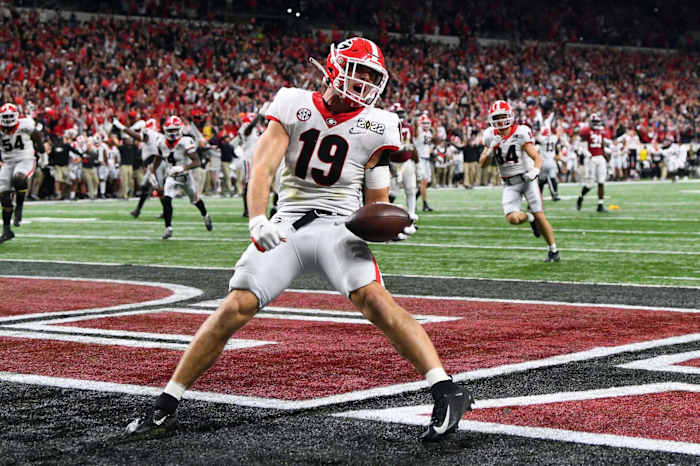 Georgia tight end Brock Bowers celebrates after scoring a touchdown in the 2022 CFP National Championship Game against Alabama. On Thursday, Bowers was selected as the preseason All-SEC First Team tight end for the second-consecutive season.