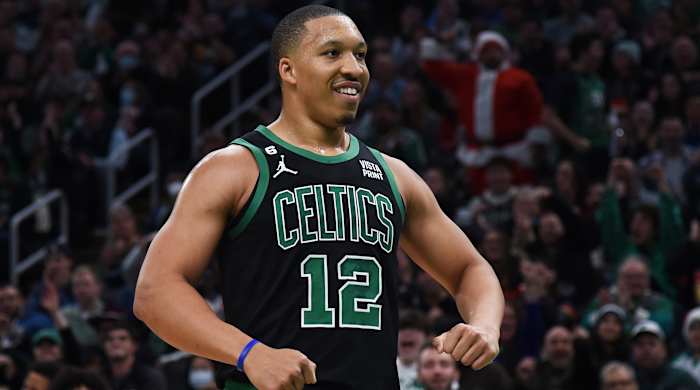 Celtics forward Grant Williams reacts after a basket during the first half against the Minnesota Timberwolves.