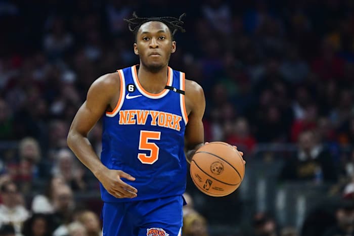 Mar 31, 2023; Cleveland, Ohio, USA; New York Knicks guard Immanuel Quickley (5) brings the ball up court during the first half against the Cleveland Cavaliers at Rocket Mortgage FieldHouse. Mandatory Credit: Ken Blaze-USA TODAY Sports