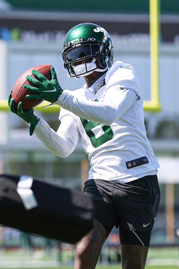 Jets' WR Mecole Hardman makes a catch at Training Camp on July 22.
