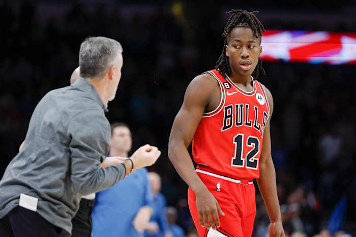 Nov 25, 2022; Oklahoma City, Oklahoma, USA; Chicago Bulls head coach Billy Donovan talks to guard Ayo Dosunmu (12) between plays against the Oklahoma City Thunder during overtime at Paycom Center.