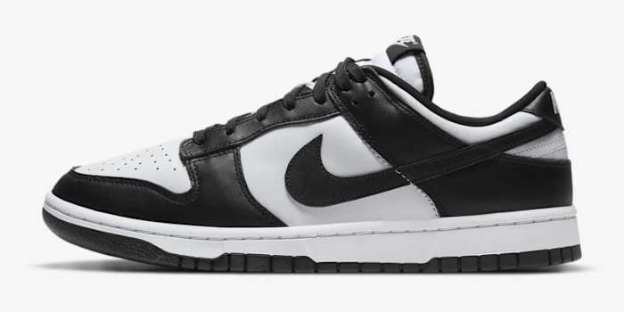 Side view of a black and white Nike Dunk sneaker.
