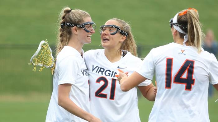 Mackenzie Hoeg celebrates with Kate Miller and Morgan Schwab after scoring a goal during the Virginia women's lacrosse game against Notre Dame at Klockner Stadium.