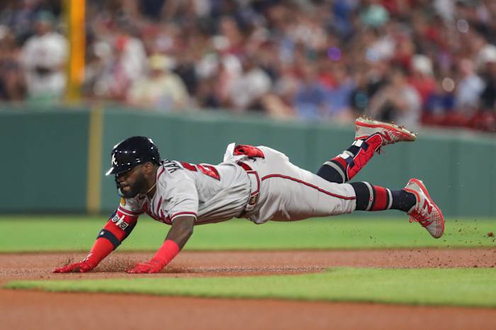 Jul 26, 2023; Boston, Massachusetts, USA; Atlanta Braves center fielder Michael Harris (23) slides into during the sixth inning against the Boston Red Sox at Fenway Park. Mandatory Credit: Paul Rutherford-USA TODAY Sports