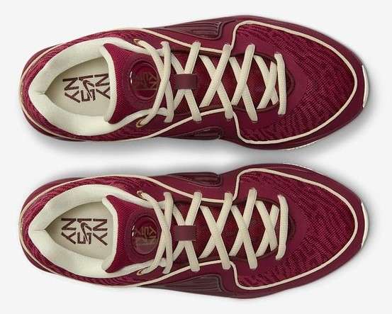 View of Kevin Durant's red and gold basketball shoes.