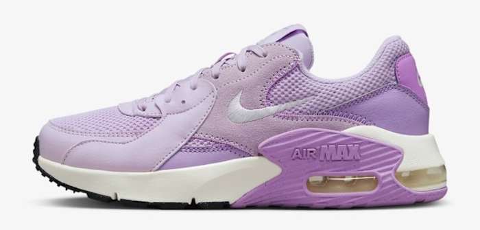 Side view of a pink and white Nike Air Max shoe.