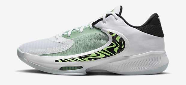 Side view of a green and white Nike basketball shoe.