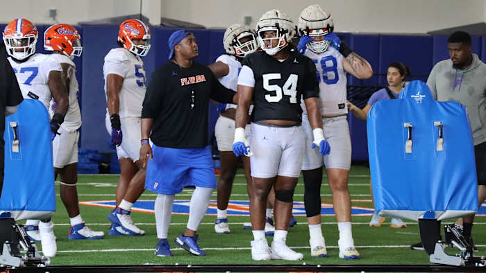 Florida Gators OL Micah Mazzccua and OL coach Darnell Stapleton