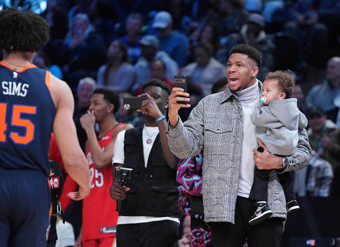Milwaukee Bucks forward Giannis Antetokounmpo reacts after a dunk by New York Knicks center Jericho Sims (45) in the Dunk Contest during the 2023 All Star Saturday Night