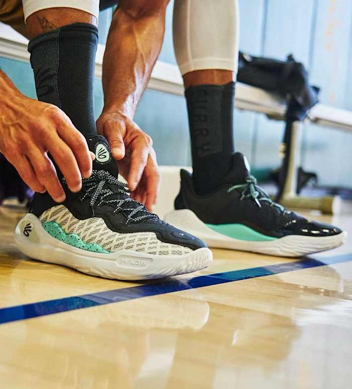 View of Stephen Curry's black and white shoes.