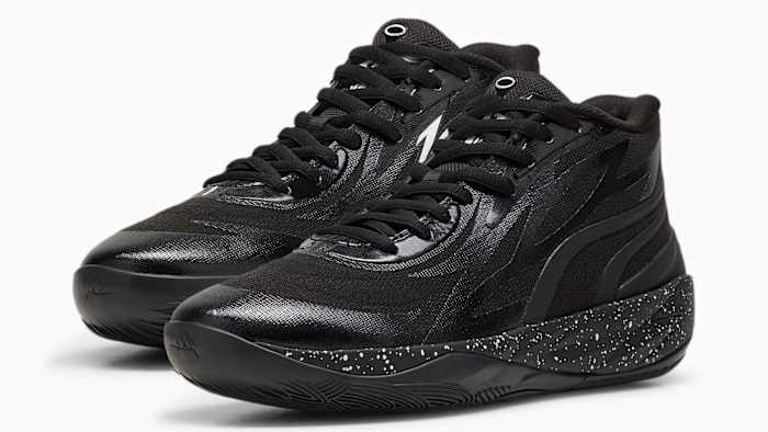 Side view of LaMelo Ball's black PUMA shoes.