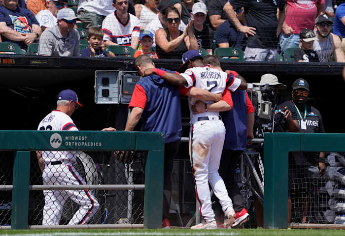 Tim Anderson limps off the field.