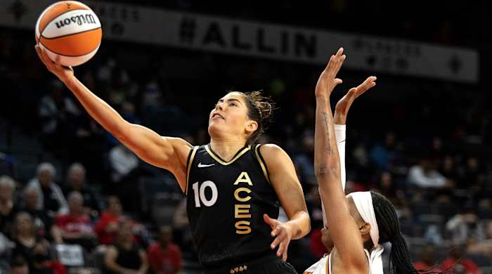 Aces guard Kelsey Plum shoots ahead of Mercury forward Brianna Turner.