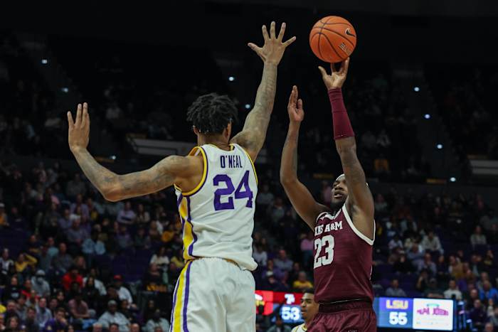 Shareef O'Neal goes up to block a shot against Texas A&M in the Pete Maravich Assembly Center, showing off his tremendous length.