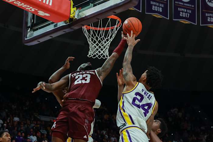 Shareef O'Neal puts on display his length, altering a shot from Texas A&M in the Pete Maravich Assembly Center.