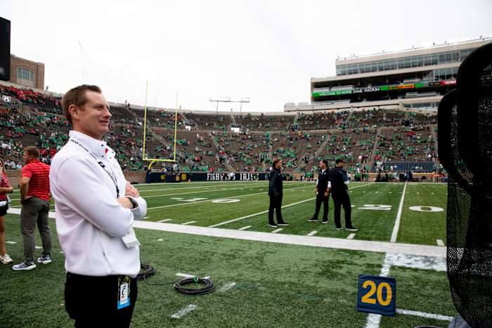 John Cunningham, University of Cincinnati athletic director, looks on before the NCAA football game between the Cincinnati Bearcats and the Notre Dame Fighting Irish on Saturday, Oct. 2, 2021, at Notre Dame Stadium in South Bend, Ind. Cincinnati Bearcats At Notre Dame Fighting Irish 173