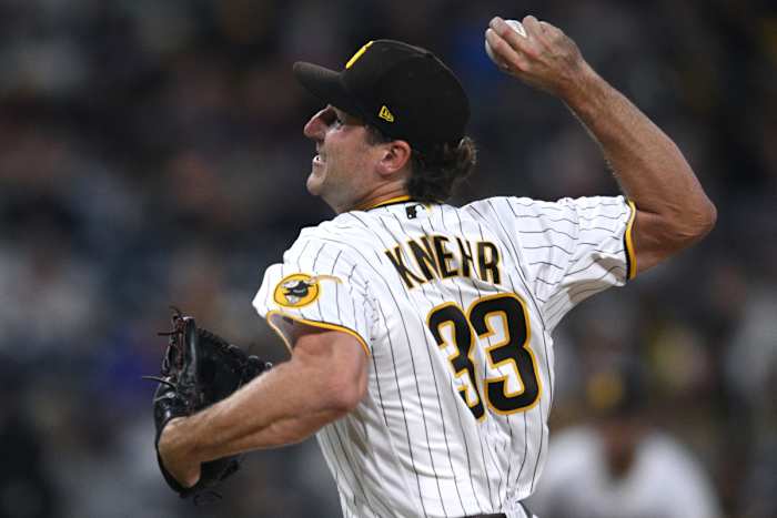 Jun 11, 2022; San Diego, California, USA; San Diego Padres relief pitcher Reiss Knehr (33) throws a pitch against the Colorado Rockies during the seventh inning at Petco Park. Mandatory Credit: Orlando Ramirez-USA TODAY Sports