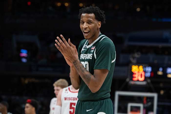 Michigan State Spartans forward Marcus Bingham Jr. (30) applauds the fans in the second half against the Wisconsin Badgers at Gainbridge Fieldhouse.