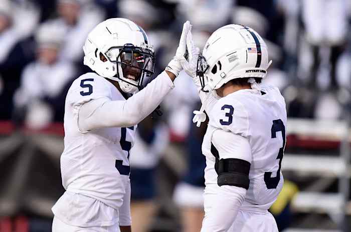 COLLEGE PARK, MARYLAND - NOVEMBER 06: Jahan Dotson #5 of the Penn State Nittany Lions celebrates with Parker Washington #3 after scoring a touchdown in the third quarter against the Maryland Terrapins at Capital One Field at Maryland Stadium on November 06, 2021 in College Park, Maryland. (Photo by Greg Fiume/Getty Images)