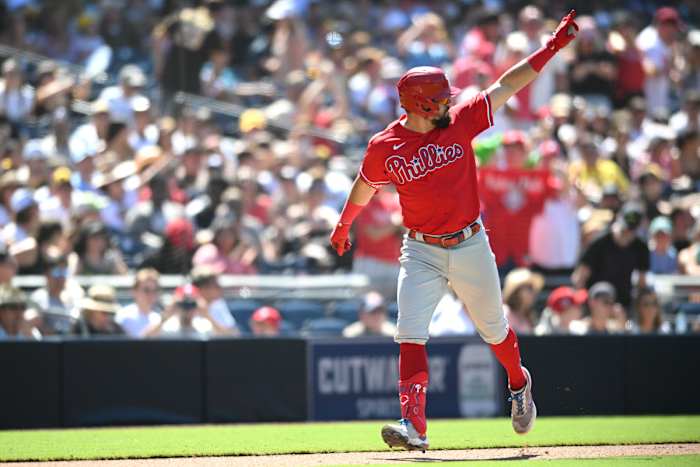 Kyle Schwarber celebrates after hitting a go-ahead three-run home run in San Diego against the Padres.