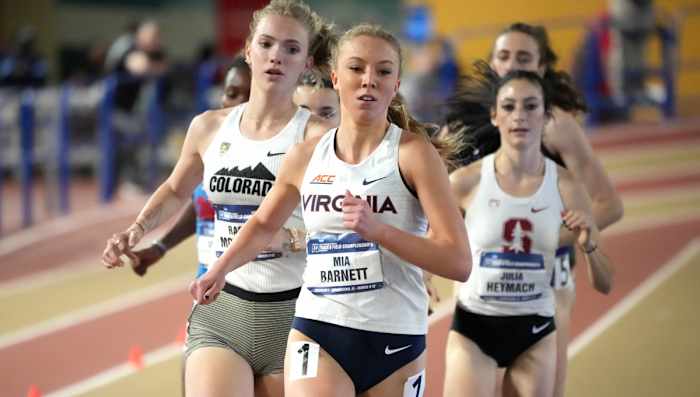 Mia Barnett of Virginia runs in a women's mile heat during the NCAA Indoor Track and Field Championships at Crossplex.