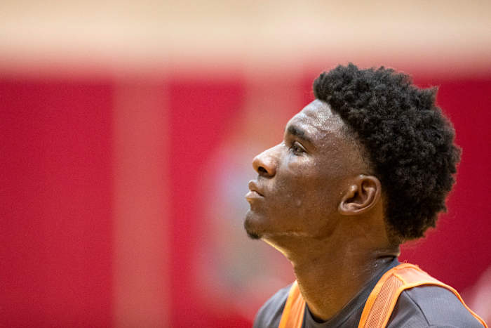 Kaleb Banks looks up at the rim at Cook Hall in Bloomington, Ind.