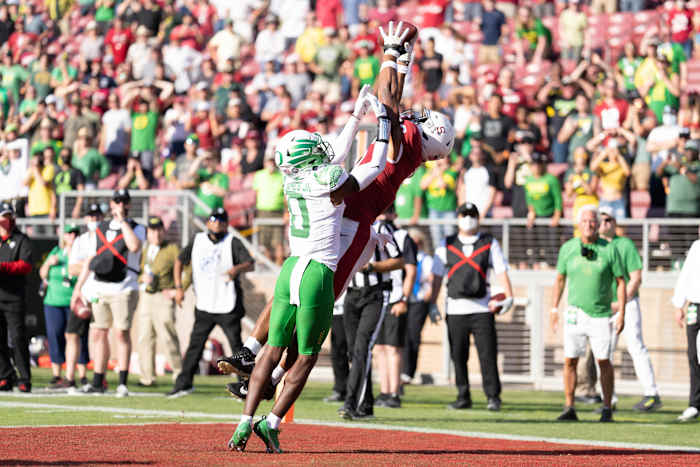 Stanford Cardinal wide receiver Elijah Higgins (6) catches the ball for a touchdown during the fourth quarter against Oregon Ducks cornerback DJ James (0) at Stanford Stadium.