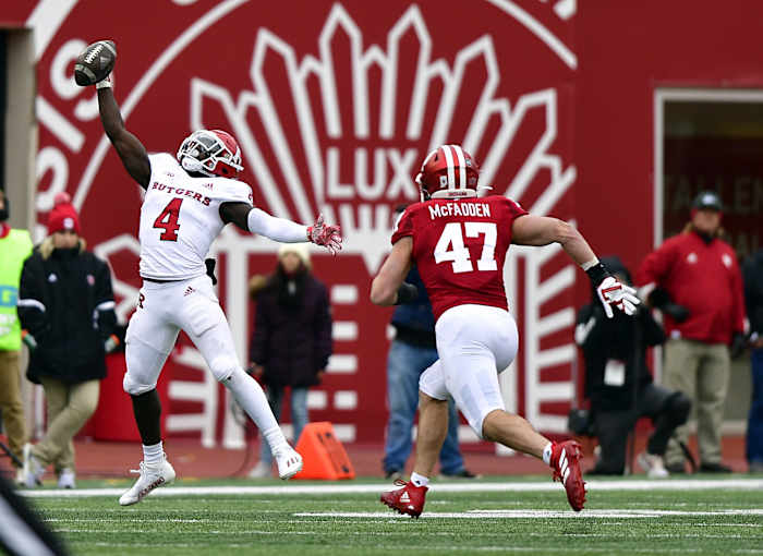 Nov 13, 2021; Bloomington, Indiana, USA; Rutgers Scarlet Knights running back Aaron Young (4) misses a pass in front of Indiana Hoosiers linebacker Micah McFadden (47) during the second half at Memorial Stadium. The Scarlet Knights won 38-3.