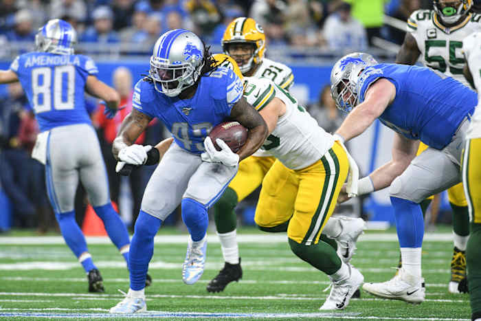 Dec 29, 2019; Detroit, Michigan, USA; Detroit Lions running back Bo Scarbrough (43) runs the ball during the first quarter against the Green Bay Packers at Ford Field. Mandatory Credit: Tim Fuller-USA TODAY Sports