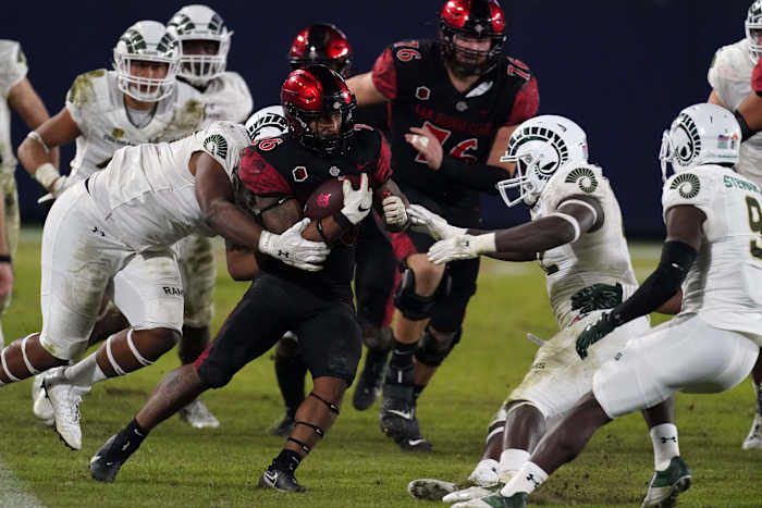 San Diego State Aztecs running back Kaegun Williams (26) carries the ball in the third quarter against the Colorado State Rams at Dignity Health Sports Park. SDSU defeated CSU 29-17