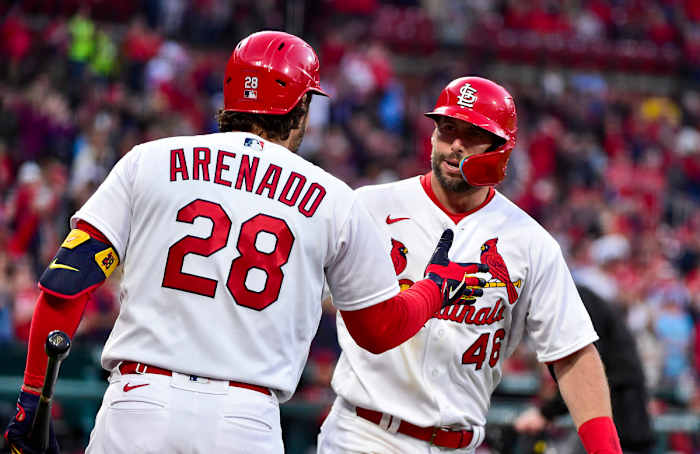 Nolan Arenado high-fives Paul Goldschmidt following his home run against the Arizona Diamondbacks.