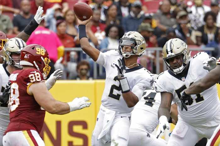New Orleans Saints quarterback Jameis Winston (2) passes the ball as Washington defensive tackle Matthew Ioannidis (98) defends. Mandatory Credit: Geoff Burke-USA TODAY