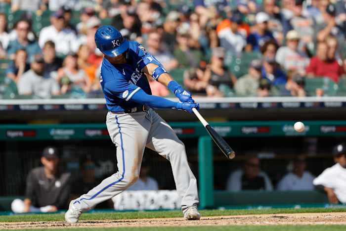 Jul 2, 2022; Detroit, Michigan, USA; Kansas City Royals second baseman Whit Merrifield (15) hits an RBI single in the fourth inning against the Detroit Tigers at Comerica Park. Mandatory Credit: Rick Osentoski-USA TODAY Sports