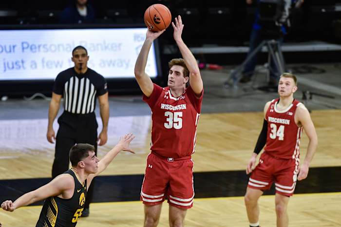 Wisconsin forward Nate Reuvers shooting a jump shot against Iowa (Credit: Jeffrey Becker-USA TODAY Sports)