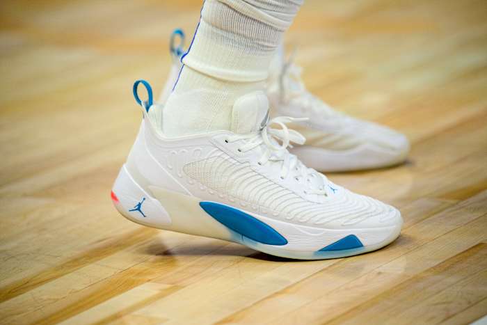 View of white and blue Jordan Luka 1 shoes.