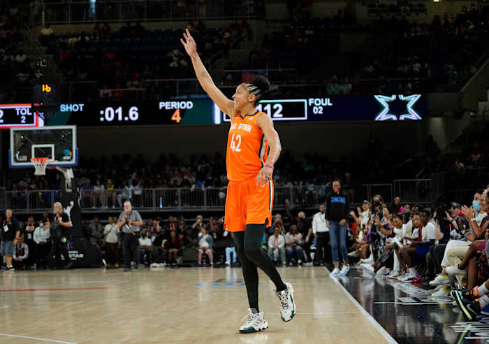 Candace Paker celebrates a made shot.