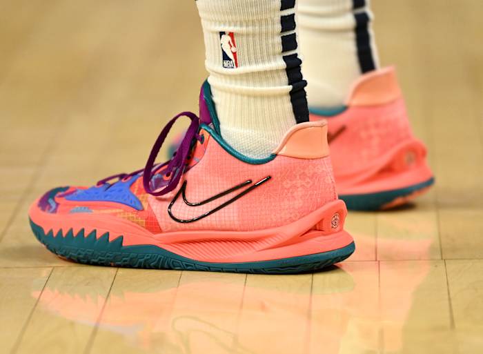 Ja Morant wearing the Nike Kyrie Low 4 '1 World 1 People'.