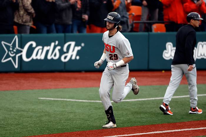 Houston Astros Prospect Jacob Melton round third for OSU.