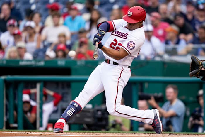 Washington Nationals’ Juan Soto hits a single during the first inning of a baseball game against the Pittsburgh Pirates at Nationals Park, Monday, June 27, 2022, in Washington.