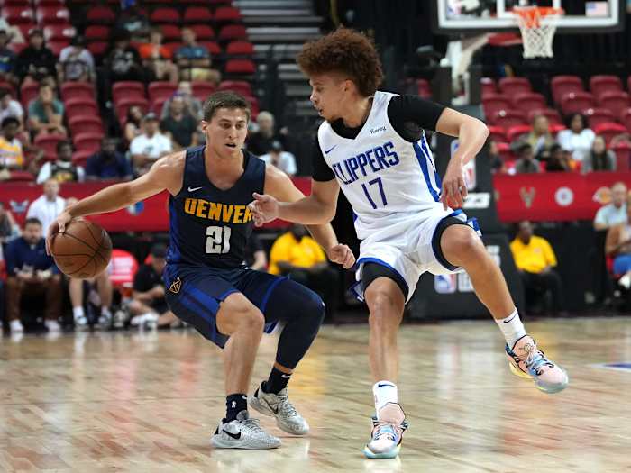 Denver Nuggets guard Collin Gillespie wearing the Nike Kobe 5 Protro 'Zebra'.