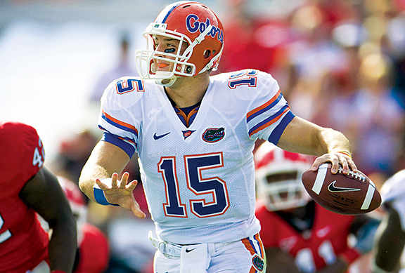 Florida Gators quarterback Tim Tebow (15) attempts a pass during the first half against the Georgia Bulldogs at Jacksonville Municipal Stadium. Florida defeated Georgia 49-10.