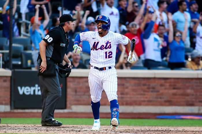 Jul 9, 2022; New York City, New York, USA; New York Mets shortstop Francisco Lindor (12) reacts after hitting a two run home run in the sixth inning against the Miami Marlins at Citi Field.