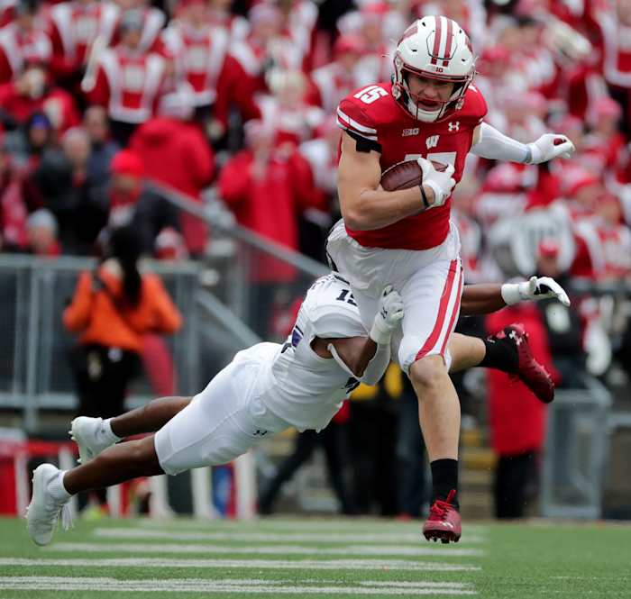 Wisconsin safety John Torchio returning an interception against Northwestern (Credit: Mark Hoffman-USA TODAY Sports)